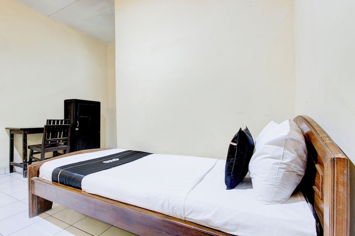 Imagen de la habitación del Hotel Collection O Stasiun Pekalongan Near Stasiun Kereta Api Formerly Indah. Foto 5