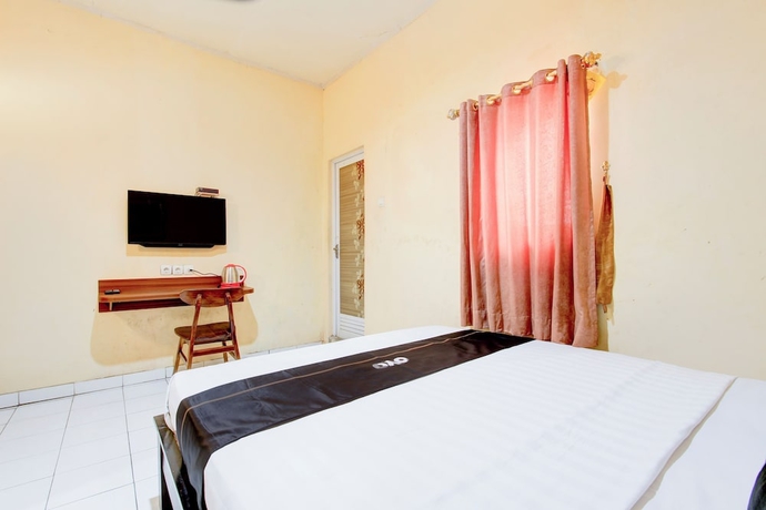 Imagen de la habitación del Hotel Collection O Stasiun Pekalongan Near Stasiun Kereta Api Formerly Indah. Foto 8