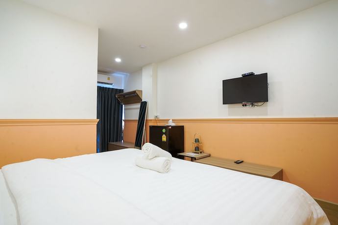 Imagen de la habitación del Hotel Collection O The Singha Chiangmai. Foto 4
