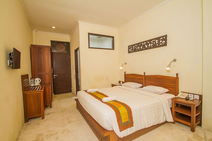 Imagen de la habitación del Hotel Collection O Ubud Near Central Ubud. Foto 12