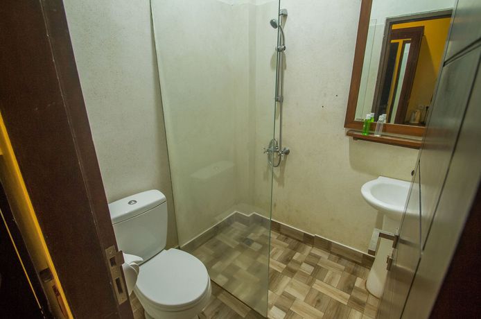 Imagen de la habitación del Hotel Collection O Ubud Near Central Ubud. Foto 13