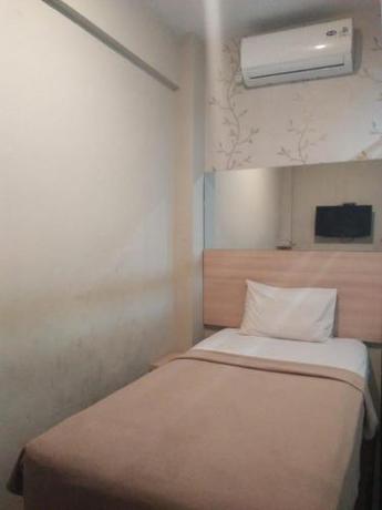 Imagen de la habitación del Hotel Collection O near Lampung City Mall. Foto 17