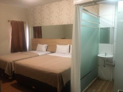 Imagen de la habitación del Hotel Collection O near Lampung City Mall. Foto 19