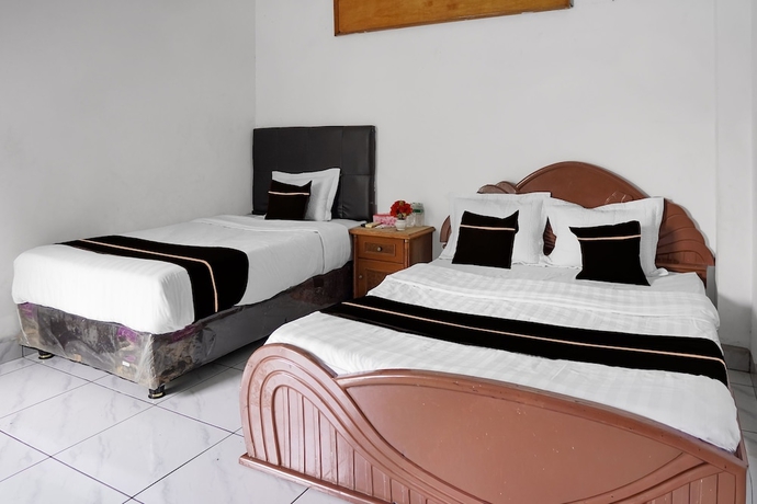 Imagen de la habitación del Hotel Collection O near Universitas Negeri Padang formerly Amra. Foto 4