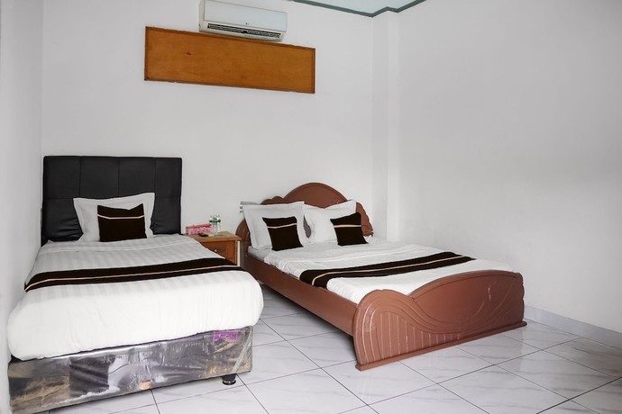 Imagen de la habitación del Hotel Collection O near Universitas Negeri Padang formerly Amra. Foto 5