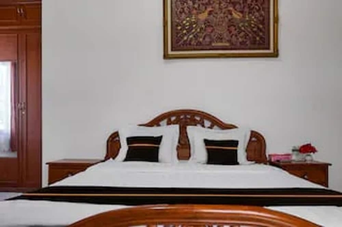 Imagen de la habitación del Hotel Collection O near Universitas Negeri Padang formerly Amra. Foto 7