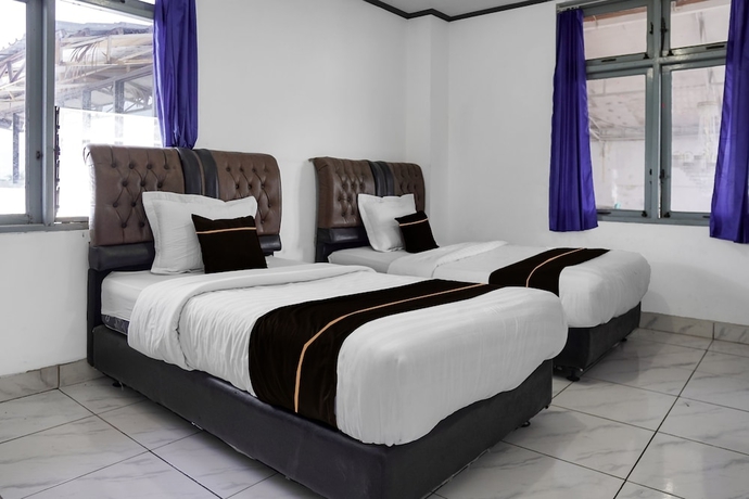 Imagen de la habitación del Hotel Collection O near Universitas Negeri Padang formerly Amra. Foto 8