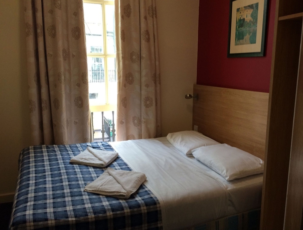 Imagen de la habitación del Hotel Colliers. Foto 4