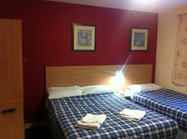 Imagen de la habitación del Hotel Colliers. Foto 7