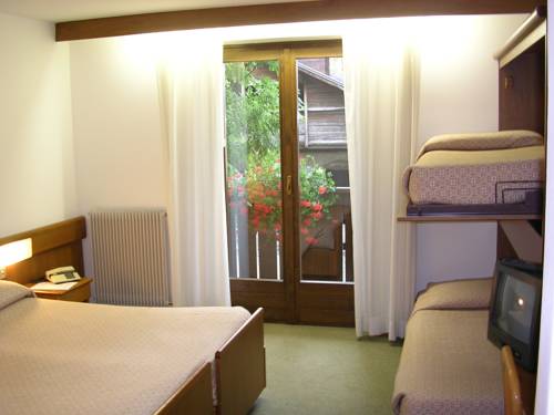 Imagen de la habitación del Hotel Collini. Foto 14