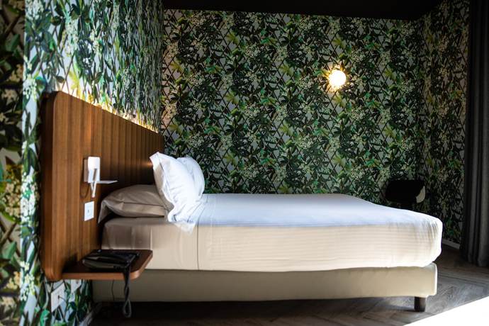 Imagen de la habitación del Hotel Collini Rooms. Foto 5
