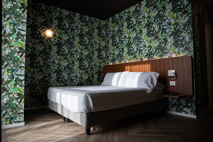 Imagen de la habitación del Hotel Collini Rooms. Foto 7