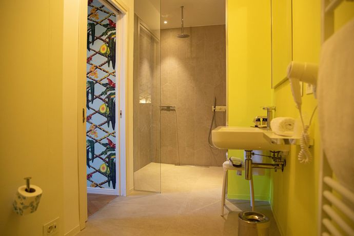 Imagen de la habitación del Hotel Collini Rooms. Foto 12