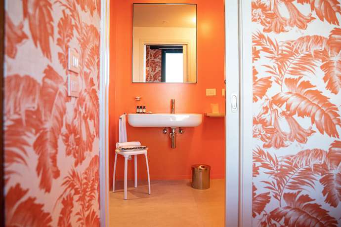 Imagen de la habitación del Hotel Collini Rooms. Foto 13