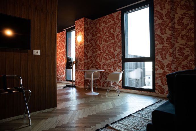 Imagen de la habitación del Hotel Collini Rooms. Foto 16