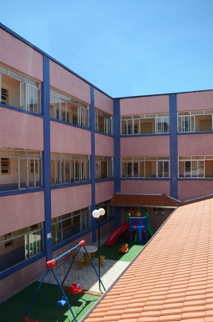 Imagen de los exteriores del Hotel Col&ocirc;nia de F&eacute;rias Praia Grande. Foto 11