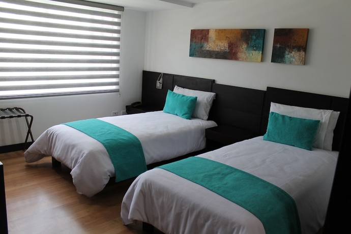 Imagen de la habitación del Hotel Colombians Suite International. Foto 5