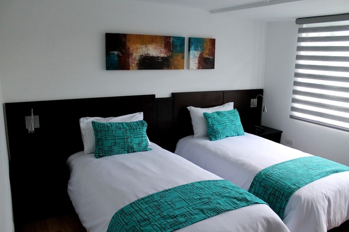 Imagen de la habitación del Hotel Colombians Suite International. Foto 6