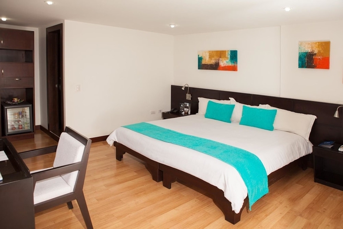 Imagen de la habitación del Hotel Colombians Suite International. Foto 9