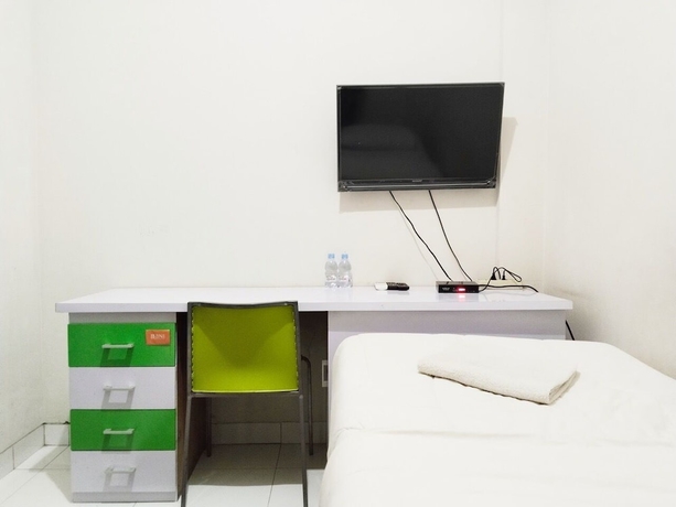 Imagen de la habitación del Hotel Colombus Homy Syariah. Foto 3