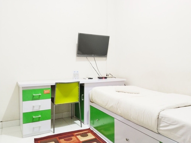 Imagen de la habitación del Hotel Colombus Homy Syariah. Foto 4