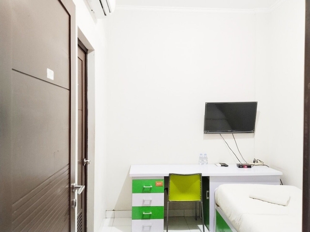 Imagen de la habitación del Hotel Colombus Homy Syariah. Foto 6