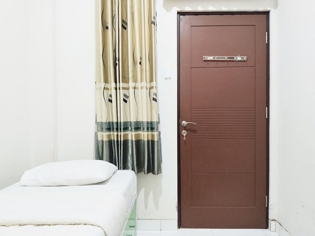 Imagen de la habitación del Hotel Colombus Homy Syariah. Foto 8