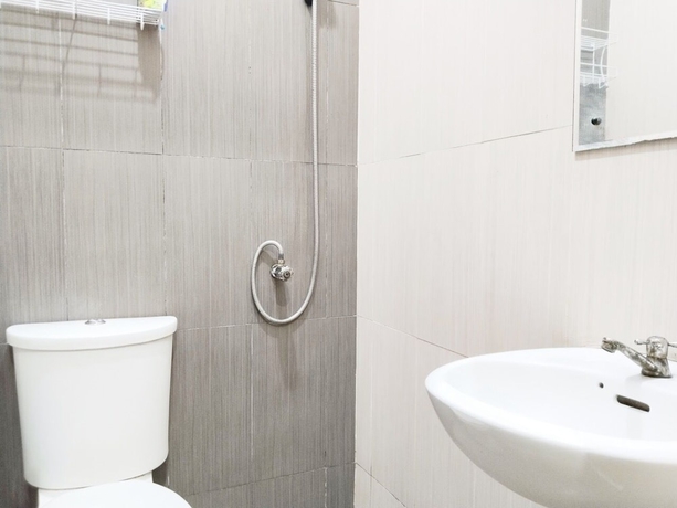 Imagen de la habitación del Hotel Colombus Homy Syariah. Foto 11