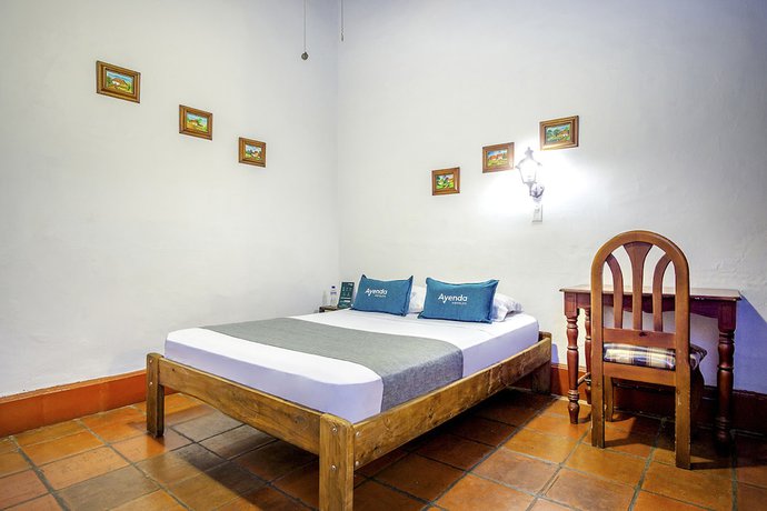 Imagen de la habitación del Hotel Colonial Palmira. Foto 11