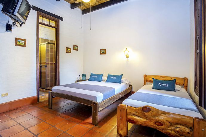 Imagen de la habitación del Hotel Colonial Palmira. Foto 14