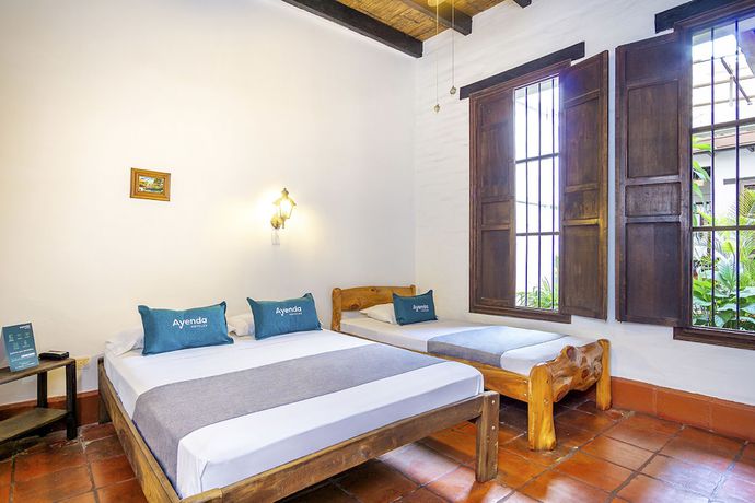 Imagen de la habitación del Hotel Colonial Palmira. Foto 16