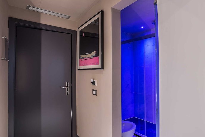 Imagen de la habitación del Hotel Colonna Suite Del Corso. Foto 2