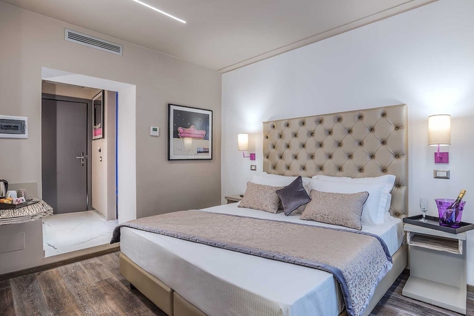 Imagen de la habitación del Hotel Colonna Suite Del Corso. Foto 3