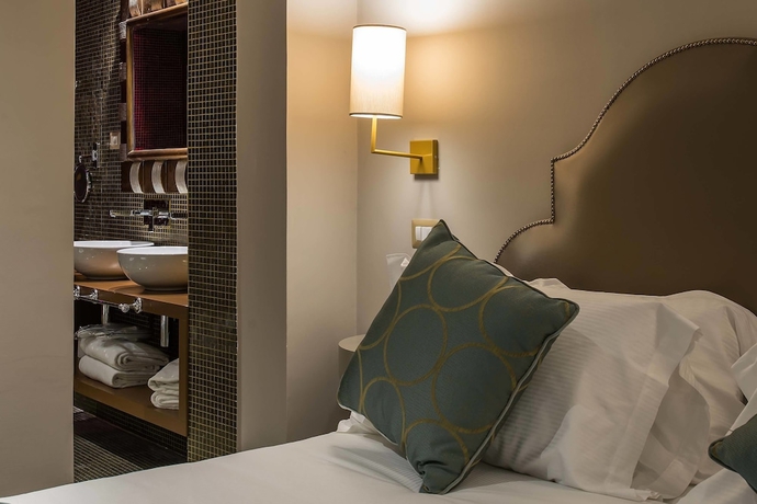 Imagen de la habitación del Hotel Colonna Suite Del Corso. Foto 5