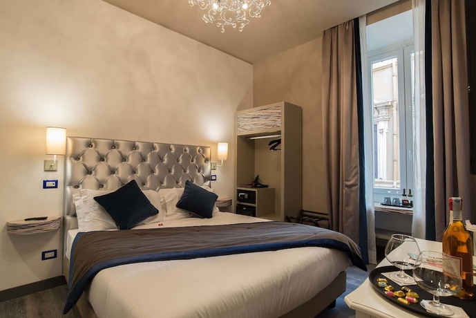 Imagen de la habitación del Hotel Colonna Suite Del Corso. Foto 7