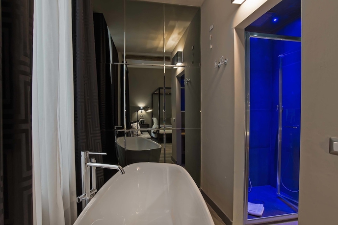 Imagen de la habitación del Hotel Colonna Suite Del Corso. Foto 9