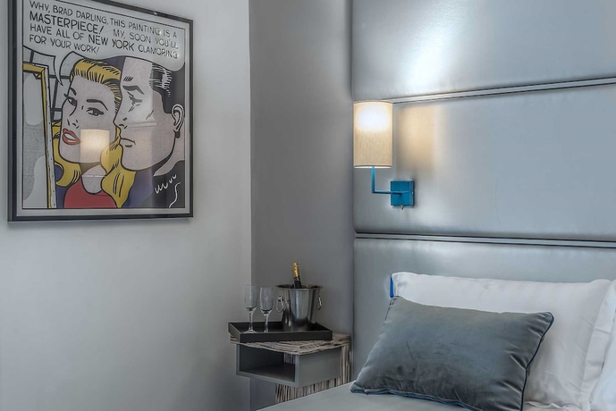 Imagen de la habitación del Hotel Colonna Suite Del Corso. Foto 11