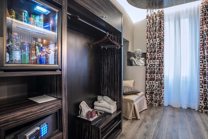 Imagen de la habitación del Hotel Colonna Suite Del Corso. Foto 13