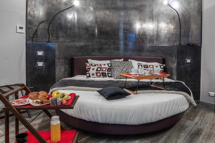 Imagen de la habitación del Hotel Colonna Suite Del Corso. Foto 14