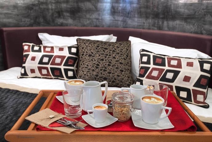 Imagen de la habitación del Hotel Colonna Suite Del Corso. Foto 17