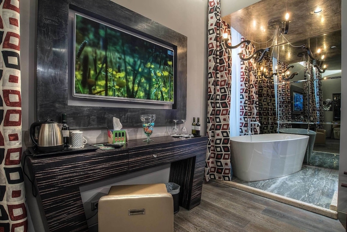 Imagen de la habitación del Hotel Colonna Suite Del Corso. Foto 18