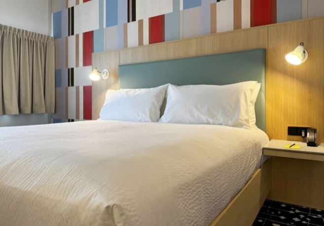 Imagen de la habitación del Hotel Colony House Motor Lodge. Foto 15