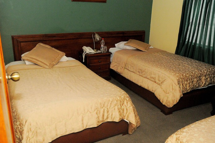 Imagen de la habitación del Hotel Colony Inn, Ambato. Foto 8