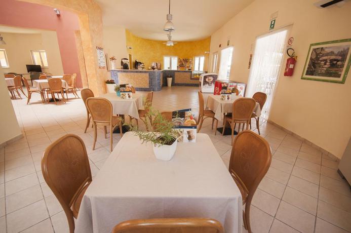 Imagen del bar/restaurante del Hotel Color Dolmen Family Village. Foto 4