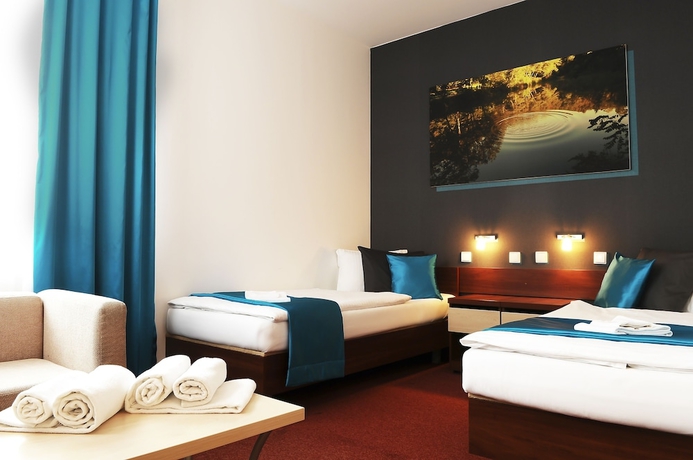 Imagen de la habitación del Hotel Color. Foto 9