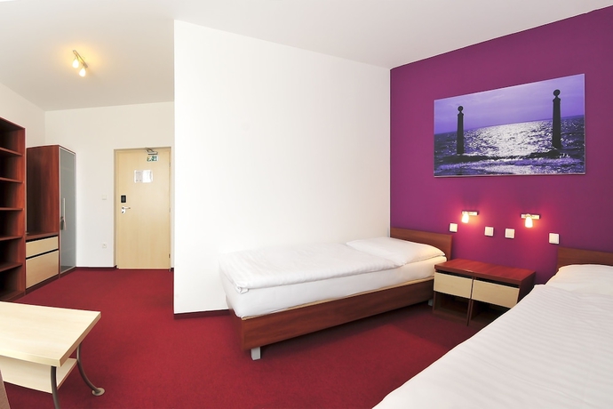 Imagen de la habitación del Hotel Color. Foto 12