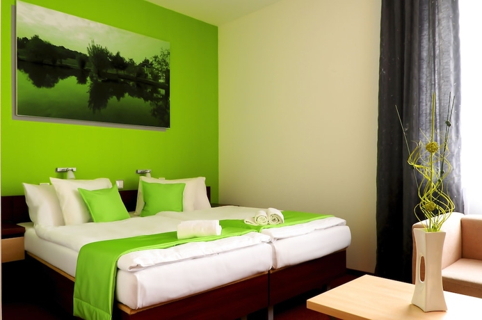 Imagen de la habitación del Hotel Color. Foto 19