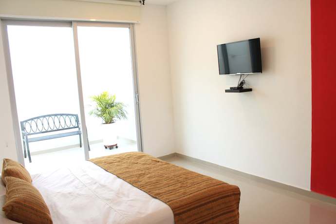 Imagen de la habitación del Hotel Color Hostel. Foto 13