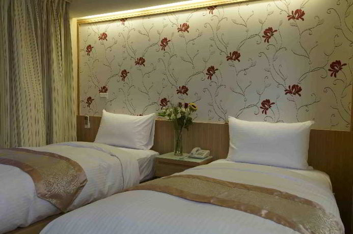 Imagen de la habitación del Hotel Color, Nuevo Taip&eacute;i. Foto 5