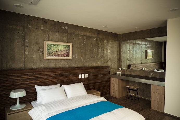 Imagen de la habitación del Hotel Color in Jeju. Foto 6